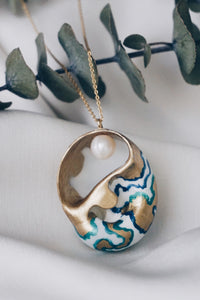 Mia sea snail necklace