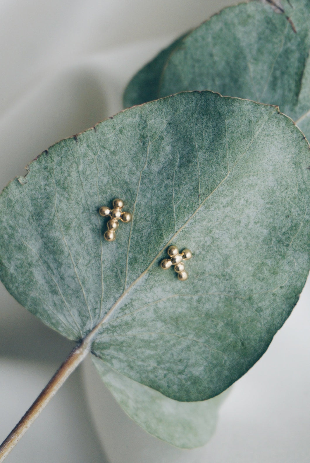 Tiny cross earrings