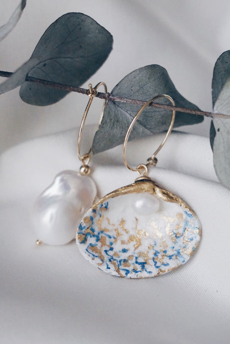 Gold seashell earrings