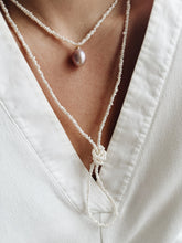 Long pearl necklace