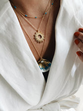 Blue oval bead necklace