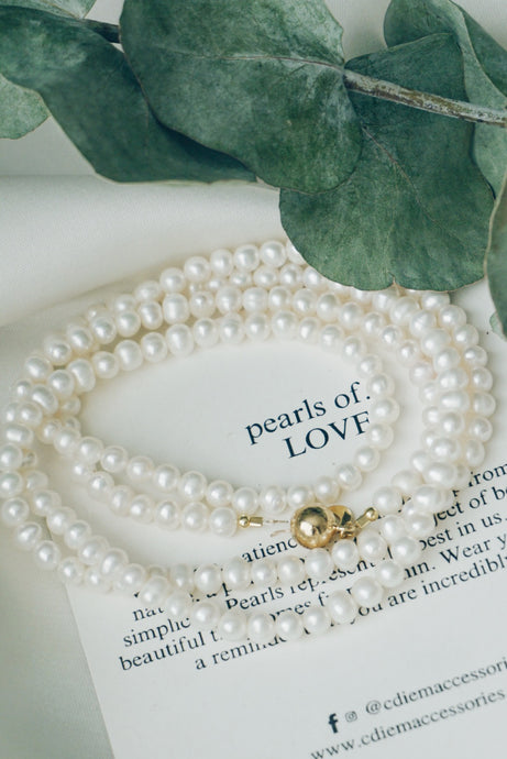 Long oval pearl necklace