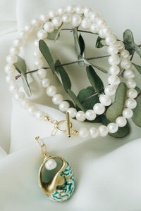Iris sea snail necklace