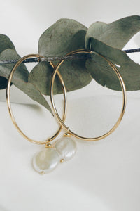 Large hoop pearl earrings