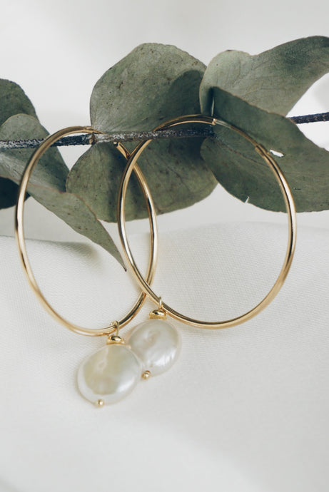 Large hoop pearl earrings