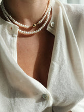 Long oval pearl necklace
