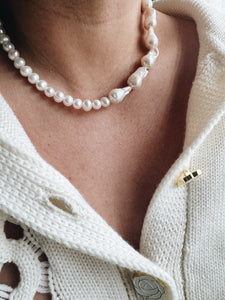 Half baroque pearl necklace