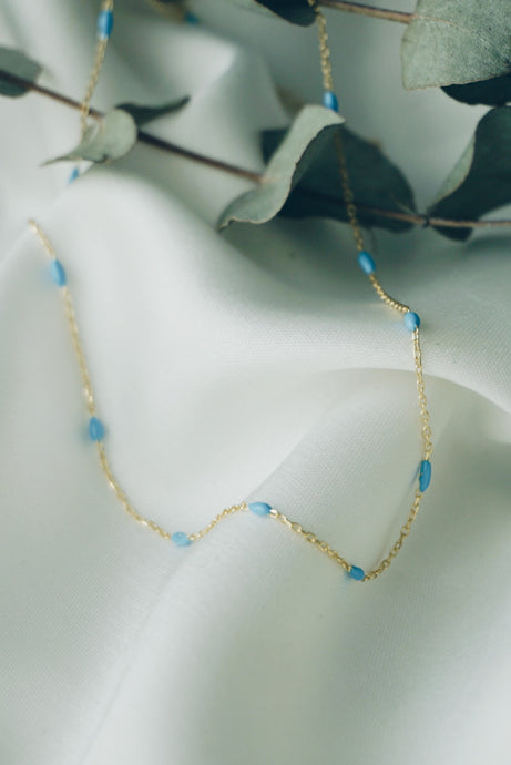 Blue oval bead necklace