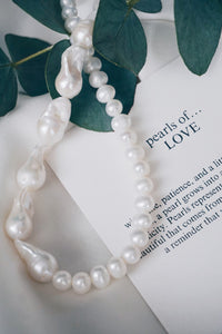 Half baroque pearl necklace