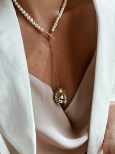 Iris sea snail necklace