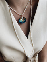 Long pearl necklace