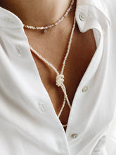 Long pearl necklace