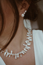 Tiny pearl earrings