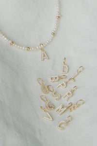 Gold pearl initial necklace