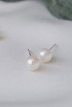 Delicate pearl earrings