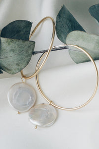 Large hoop pearl earrings