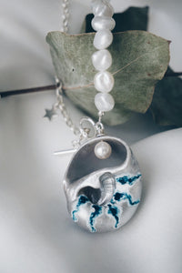 Ava sea snail necklace