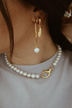 Large pearl hoop earrings