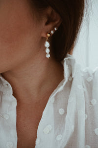 Tiny pearl earrings