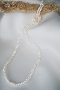 Long pearl necklace