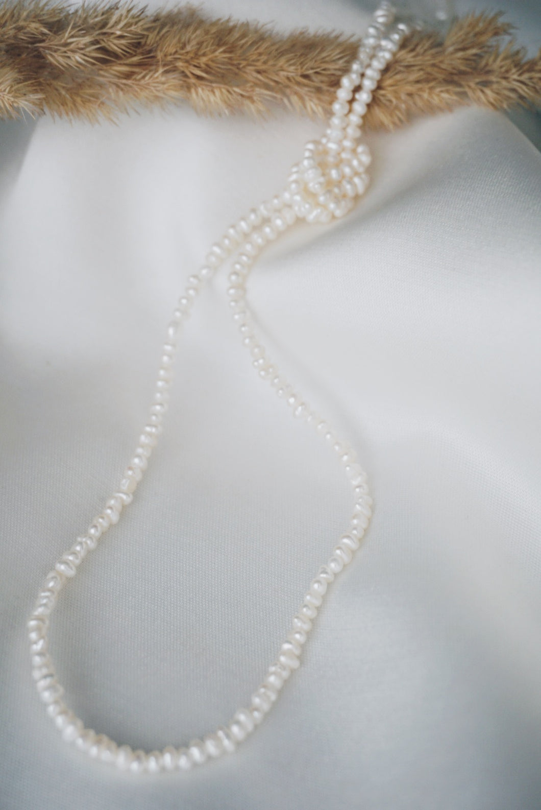 Long pearl necklace