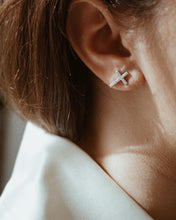 Cross stud earrings