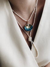 Long pearl necklace