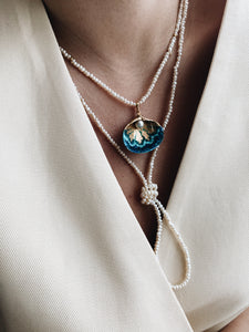 Long pearl necklace