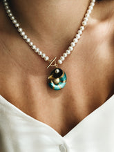 Turqoise sea snail necklace