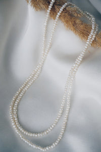 Long pearl necklace