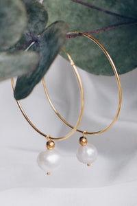 Large pearl hoop earrings