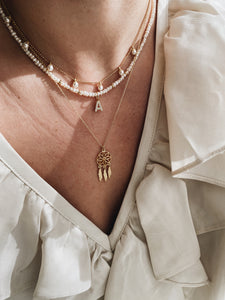 Gold pearl initial necklace
